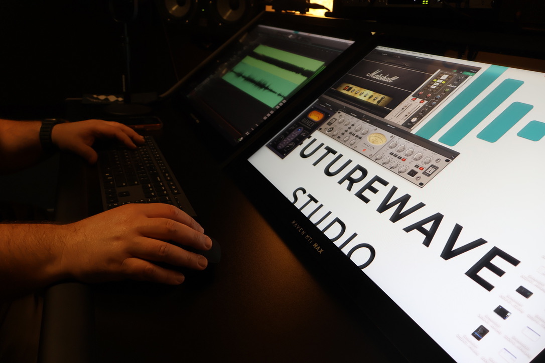 Raven working at a studio keyboard